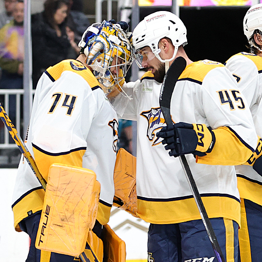 Predators goalie Juuse Saros celebrates his win with Alexandre Carrier (45)