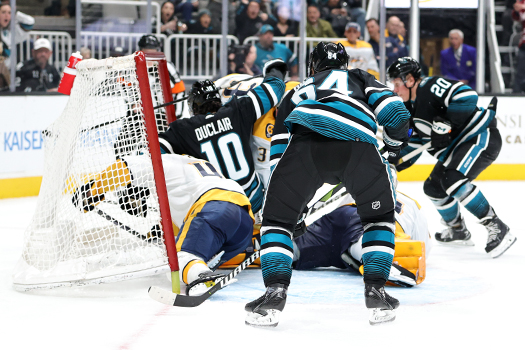 Sharks forward Anthony Duclair (10) crashes the net during third period action