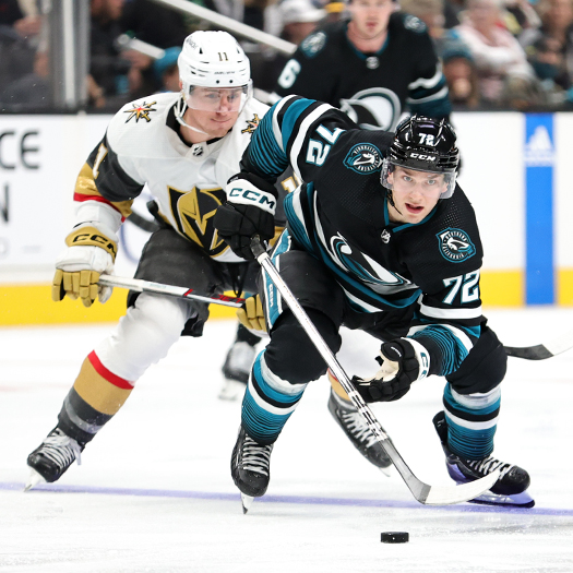 Sharks forward William Eklund (72) carries the puck into the Sharks zone in front of Mason Morelli (11) during third period action