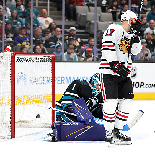 Nick Foligno (17) screens Sharks goalie Devin Cooley as Seth Jones' (not pictured) scores for the Blackhawks' third goal