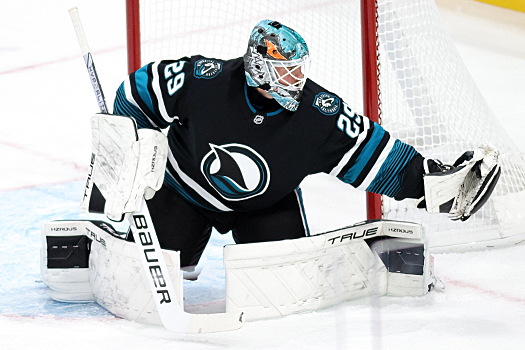Sharks goalie Mackenzie Blackwood makes a glove save during first period action